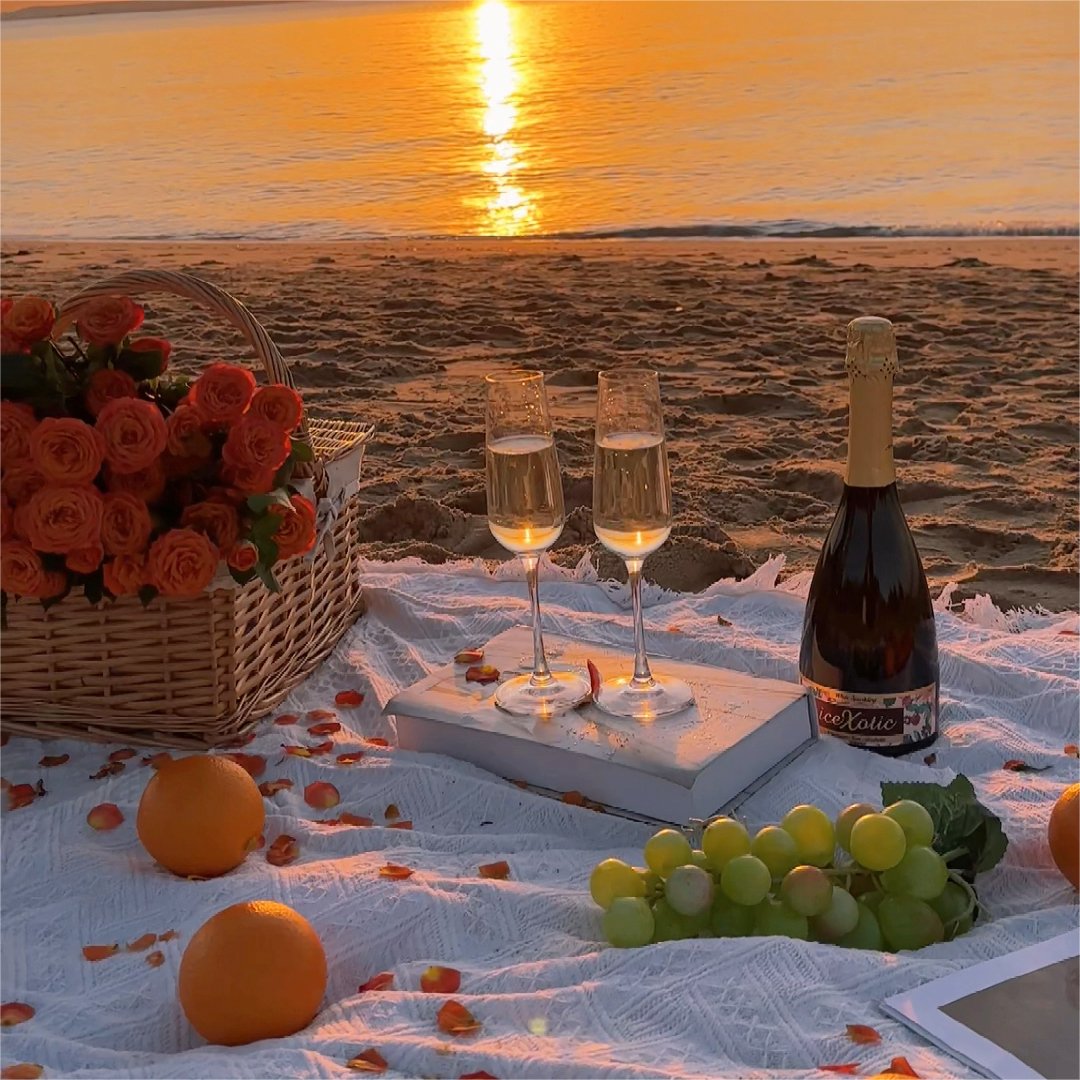 on the beach, white ins sand beach, thick outdoors, with a blanket that folds a picnic pad
