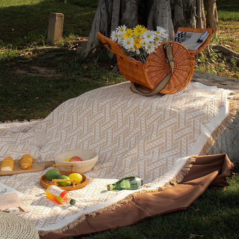 A picnic mat, camping outdoors, white blankets, beach mats, a French beach mat