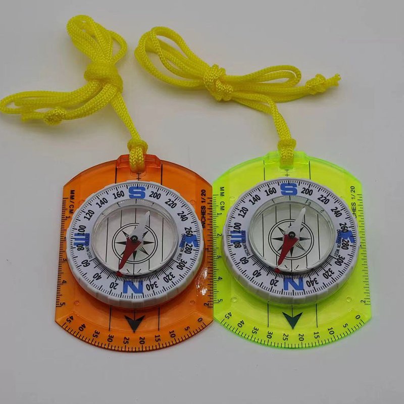 An outdoor precision compass with a child-student safe-lined science teaching tool scale to the north