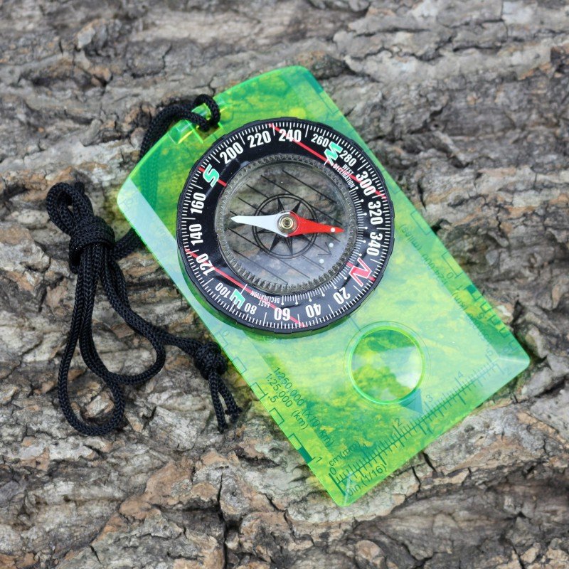 THE DC361 OPEN MULTI-PURPOSE COMPASS POINTS TO THE SCALE OF THE MAP SCALE OF THE NORTHERN ACLIKIAN COMPASS