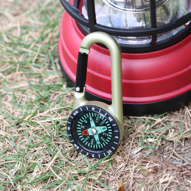Multifunctional compass points to the north alloy, the key to the compass, and the outside tactical survival equipment