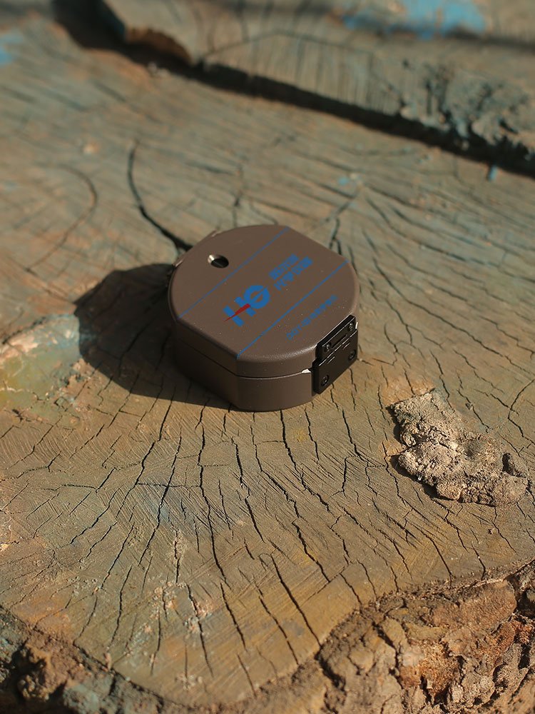 The outdoors-directional excursions point to a geologic compass using a mapping guide for students