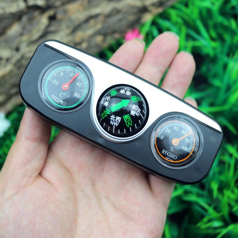 A three-to-one multi-purpose guided ball, a compass pointing to the north-cooose thermometer