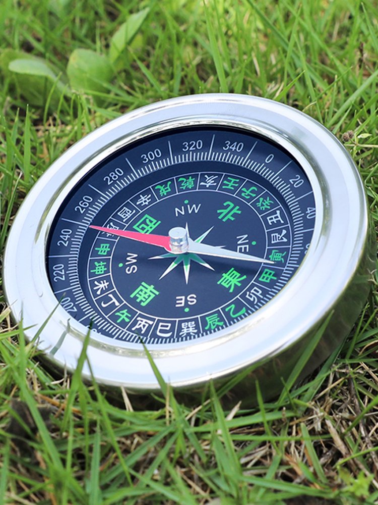 An outdoor mini-guided multi-purpose hiking camp pointing north towards the waterproofer