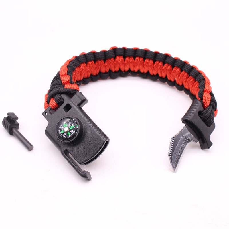 An outdoor umbrella and a multi-purpose field tactical life-rescue slicing bracelet
