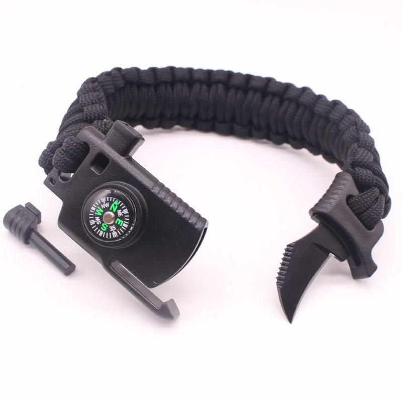 An outdoor umbrella and a multi-purpose field tactical life-rescue slicing bracelet