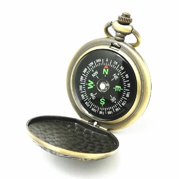 The emergency watch compass points to the northern membrane and camping students carrying them in a compass minivan