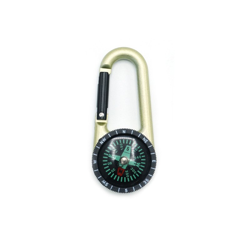 A multi-purpose compass for exterior survival equipment points to the key to the north alloy, the key to the compass