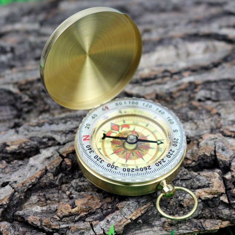 Pointing to a multi-purpose camping facility emergency life-saving navigation outside of the north-blank lid