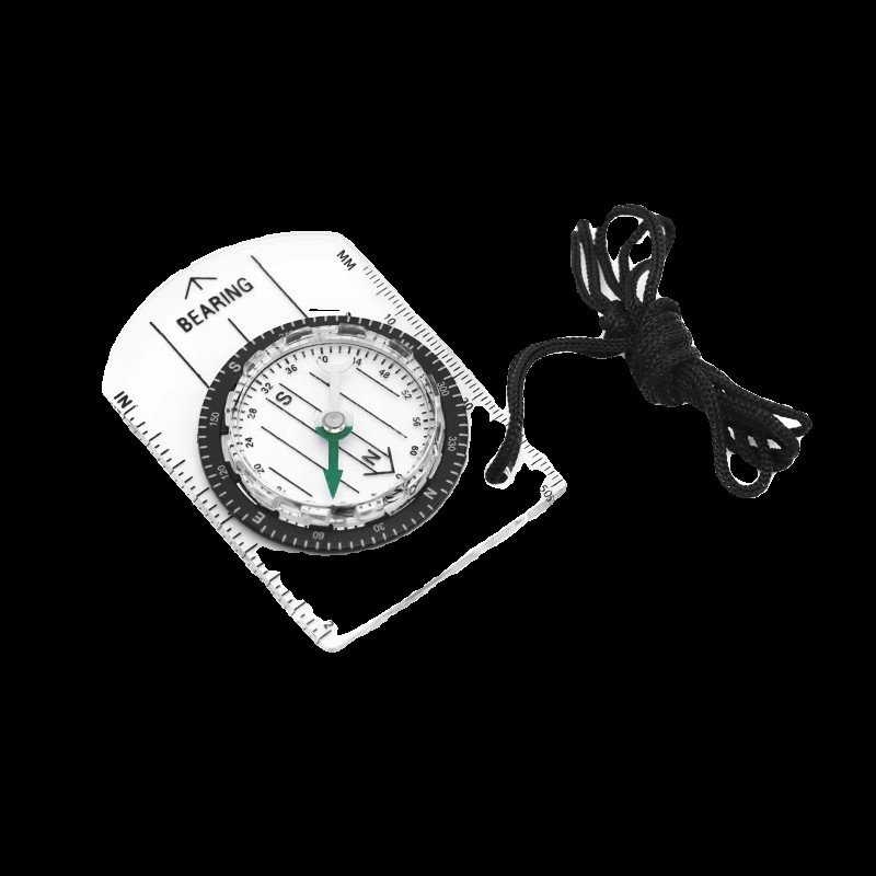 A professional multi-purpose compass for outdoor equipment in the wilderness points to a scale-scale compass of the north map