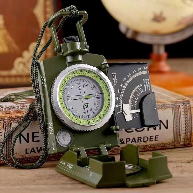An outdoor compass specializing in high-precision fluorescent outdoor tourism points to a north-clinical geological waterproofing