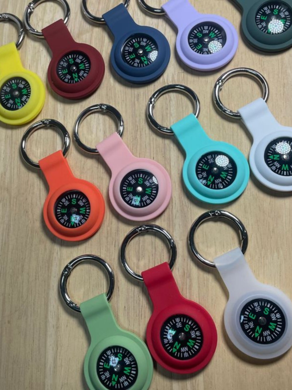 An outdoor navigation compass key to a necklace guide to a child student experiment with a northerly pointer