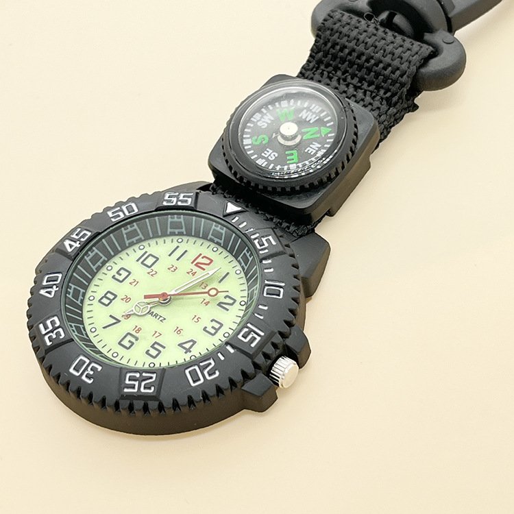 The mountain climber travels with a guideo outside and a watch, with an emergency survival and prevention kit