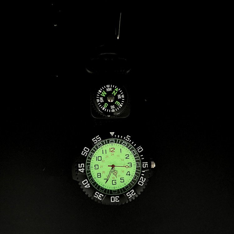 The mountain climber travels with a guideo outside and a watch, with an emergency survival and prevention kit