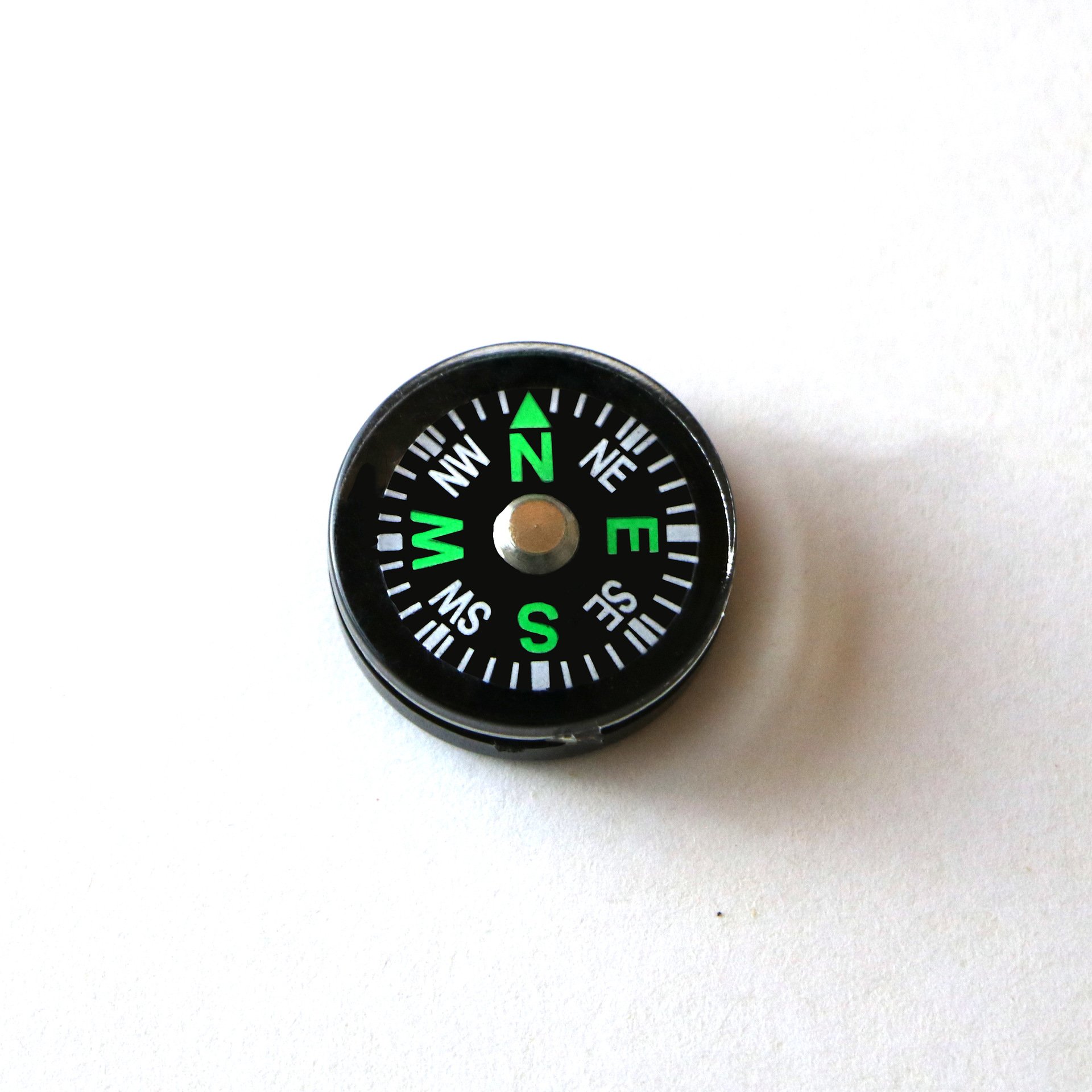 A compass, a multifunctional pin for accessories