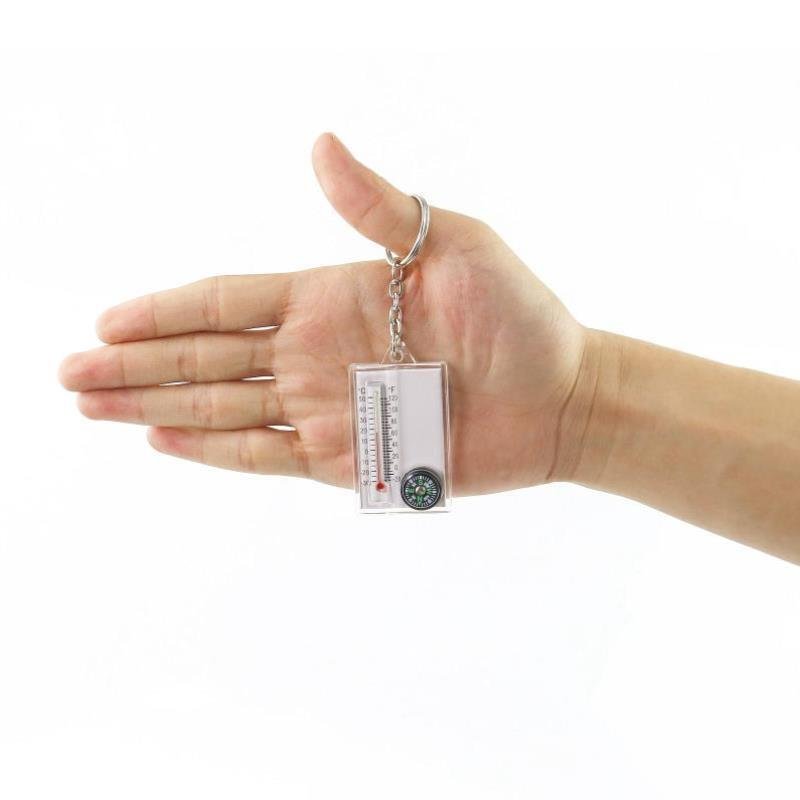 Key button points to the direction of a portable, small-sized, outdoor thermometer walker