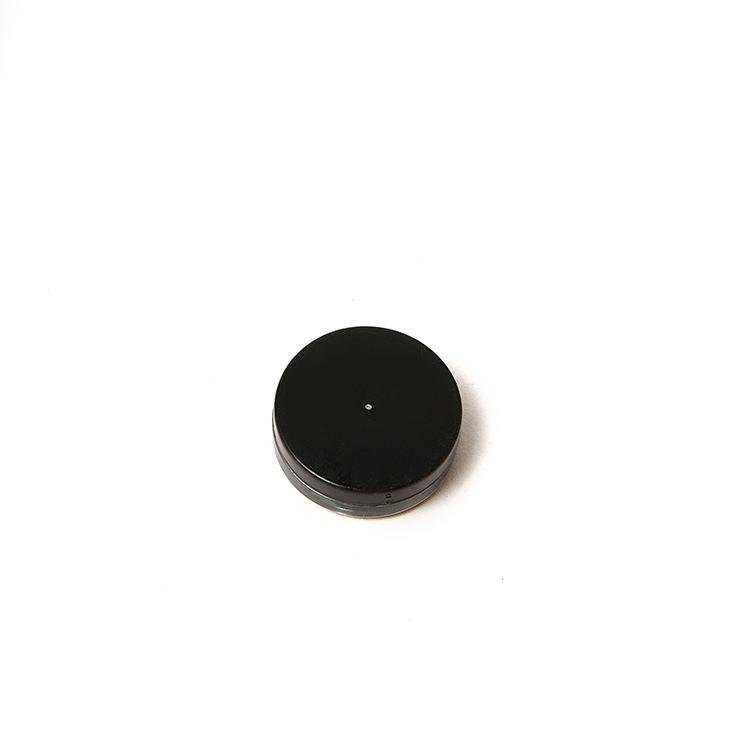 the 27mm compass, the plastic-precision compass, the oil, and the north needle