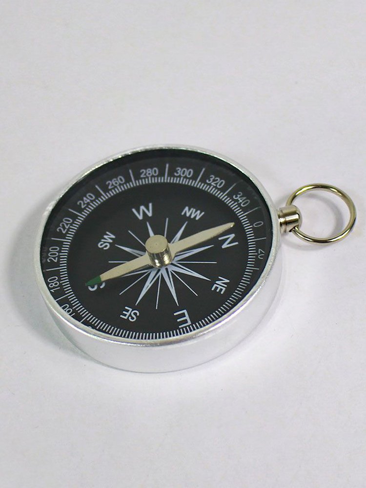THE G44 DIAMETER RING KEY BUTTON IS USED TO POINT THE NORTHERLY POINTER WITH THE ALUMINUM ALLOY TO THE FIELD CAMP