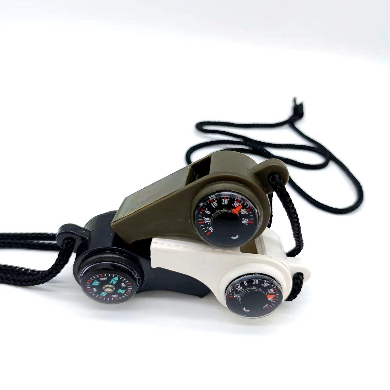 An outdoor multi-purpose whistle. Triple a life-saving whistle line thermometer compass