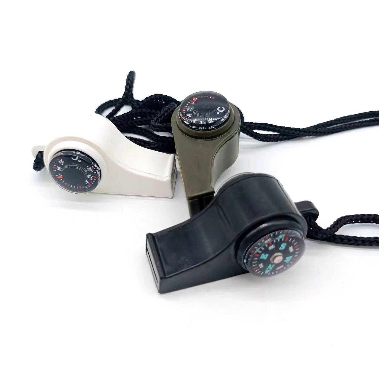 An outdoor multi-purpose whistle. Triple a life-saving whistle line thermometer compass