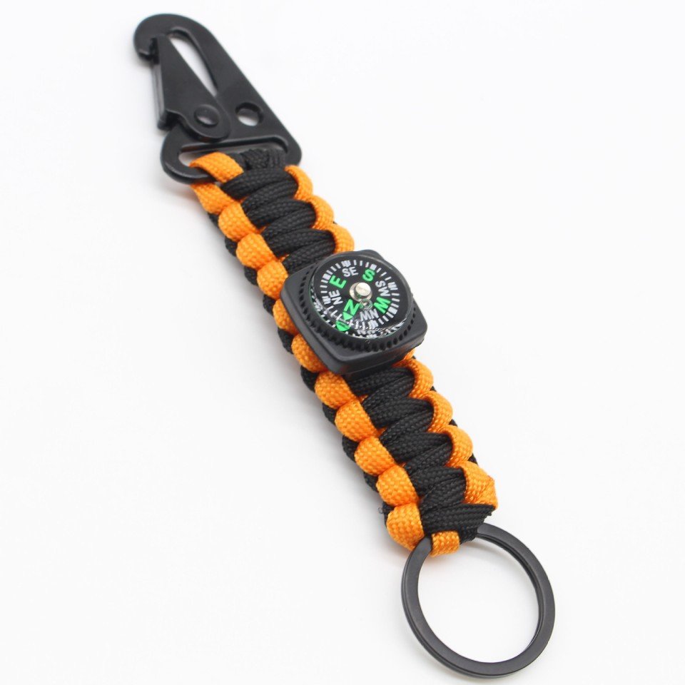The outdoors travel with camping umbrella ropes to knit the key to the compass