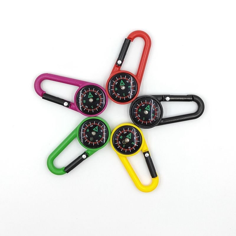 Portable liquid suspension pointer of an outdoor mountain landing compass linked to a multifunctional fast-track compass