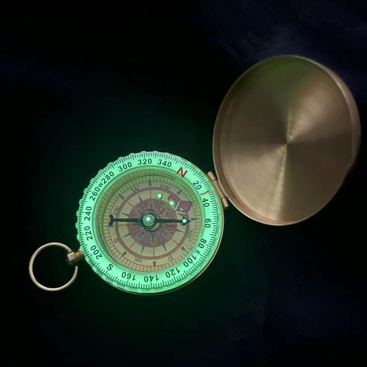 Turning over the brass compass enhances the long-lived night watch compass for high-precision outdoor travel