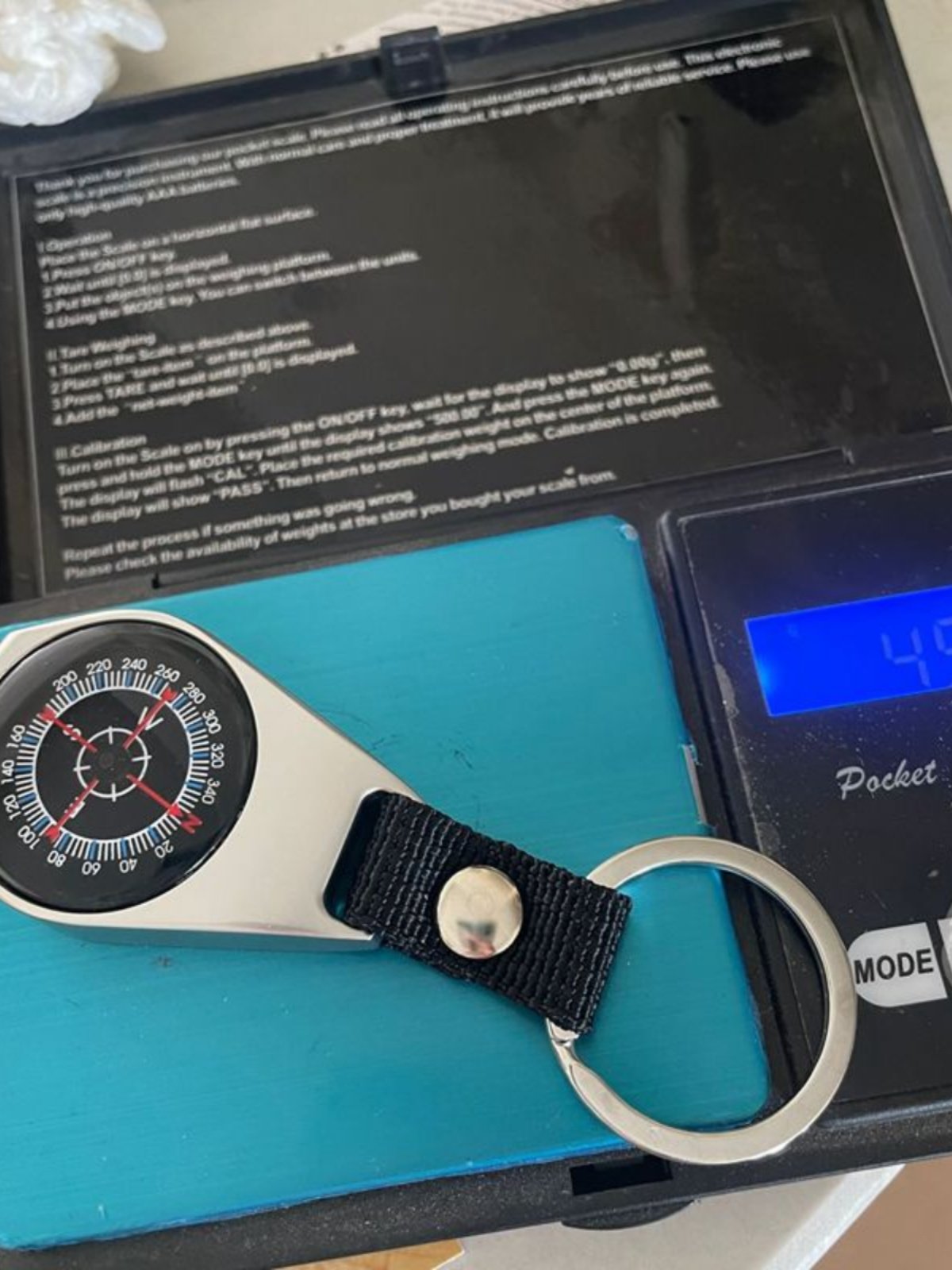 AN OUTDOOR NAVIGATION STUDENT EXPERIMENT WITH HIGH-PRECISION KEY BUTTON POINTS TO A HIGH-QUALITY NORTHERN METAL COMPASS THAT CAN BE CUSTOMISED TO LOGO