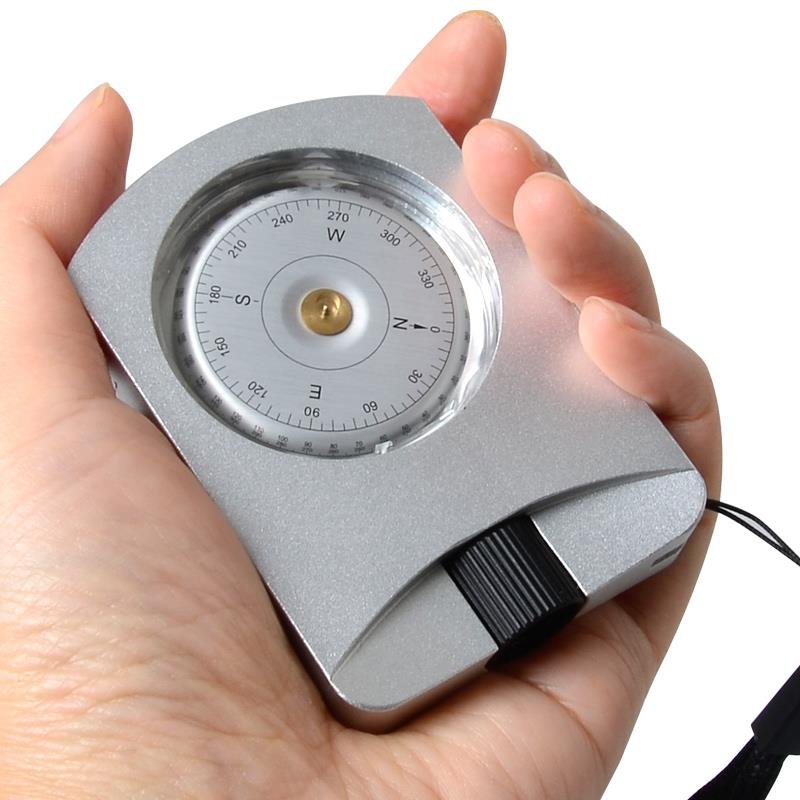 A car-borne compass with a high-precision point to a geography compass directed from the north to the open