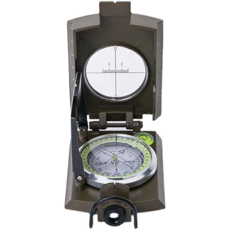 The Chinese-American multifunctional compass points to the north, the outdoor geographer, the slope fluorescent. Photoboard