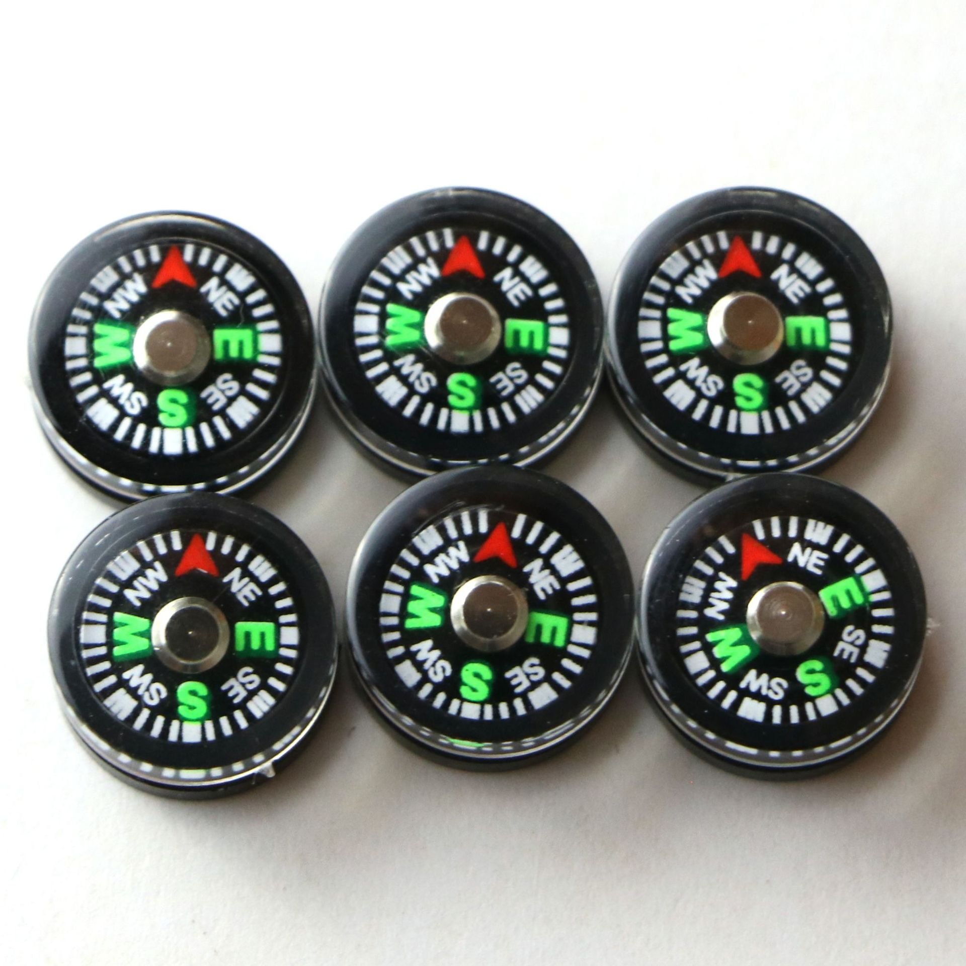 a 12-mm compass pointing to the north, a good-quality outdoor guide to oily plastic, a mini-mini event gift