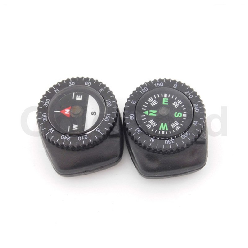 An outdoor magnetic-oil-free cross-country compass points to a northerly wristwatch, so it's free