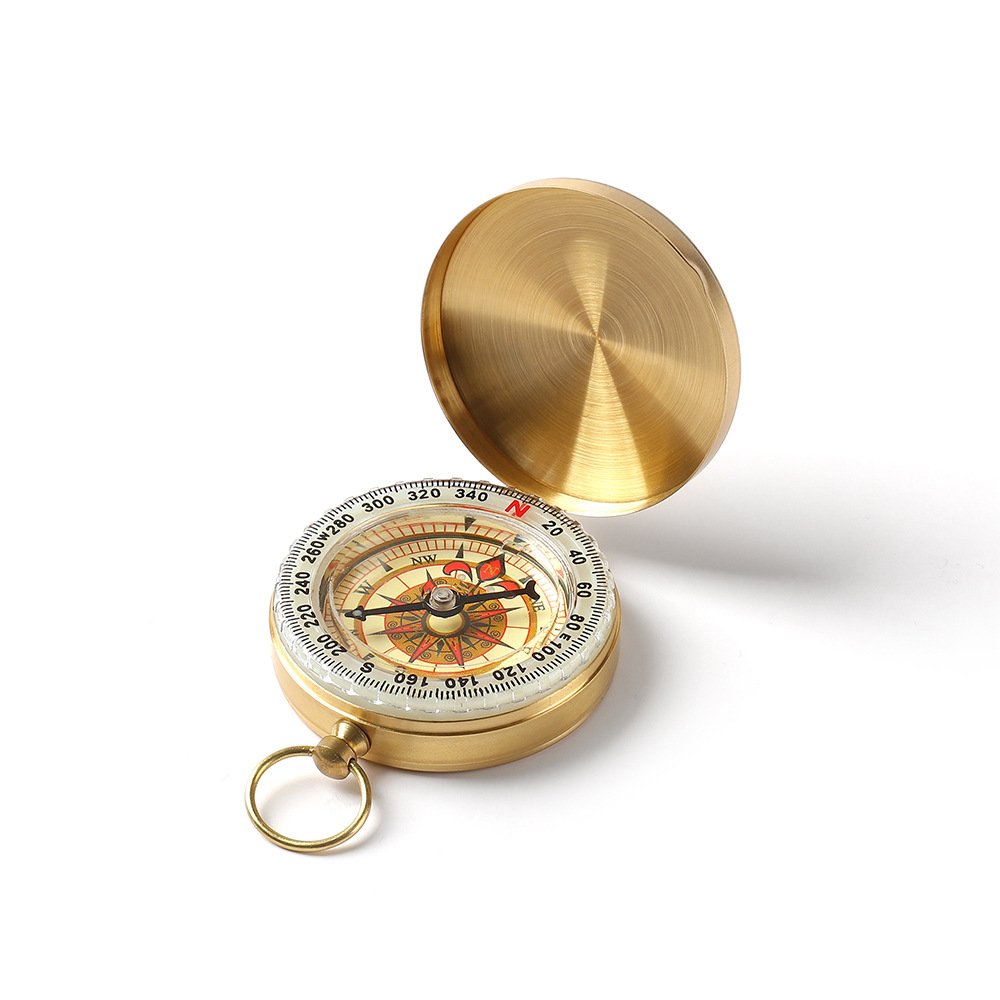 complimentary gift-ordered logo outdoors with a map of the night-lighted gold compass company