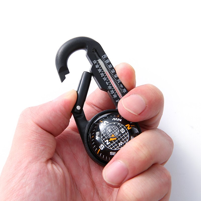 A multi-purpose outdoor compass thermometer, a portable key button compass