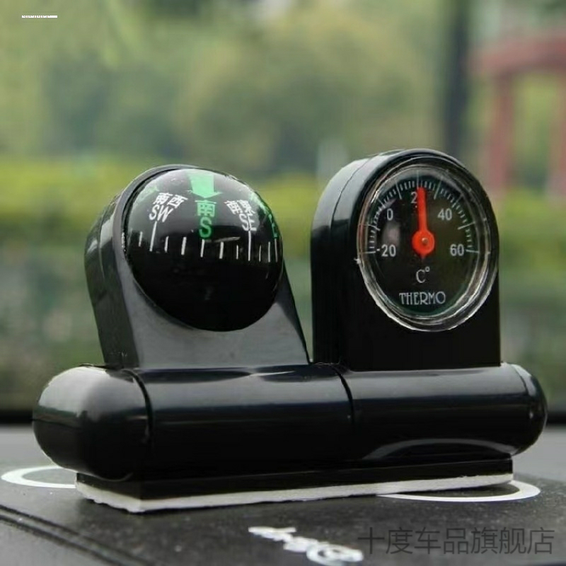 A pin with a two-guided thermometer and a compass, a compass