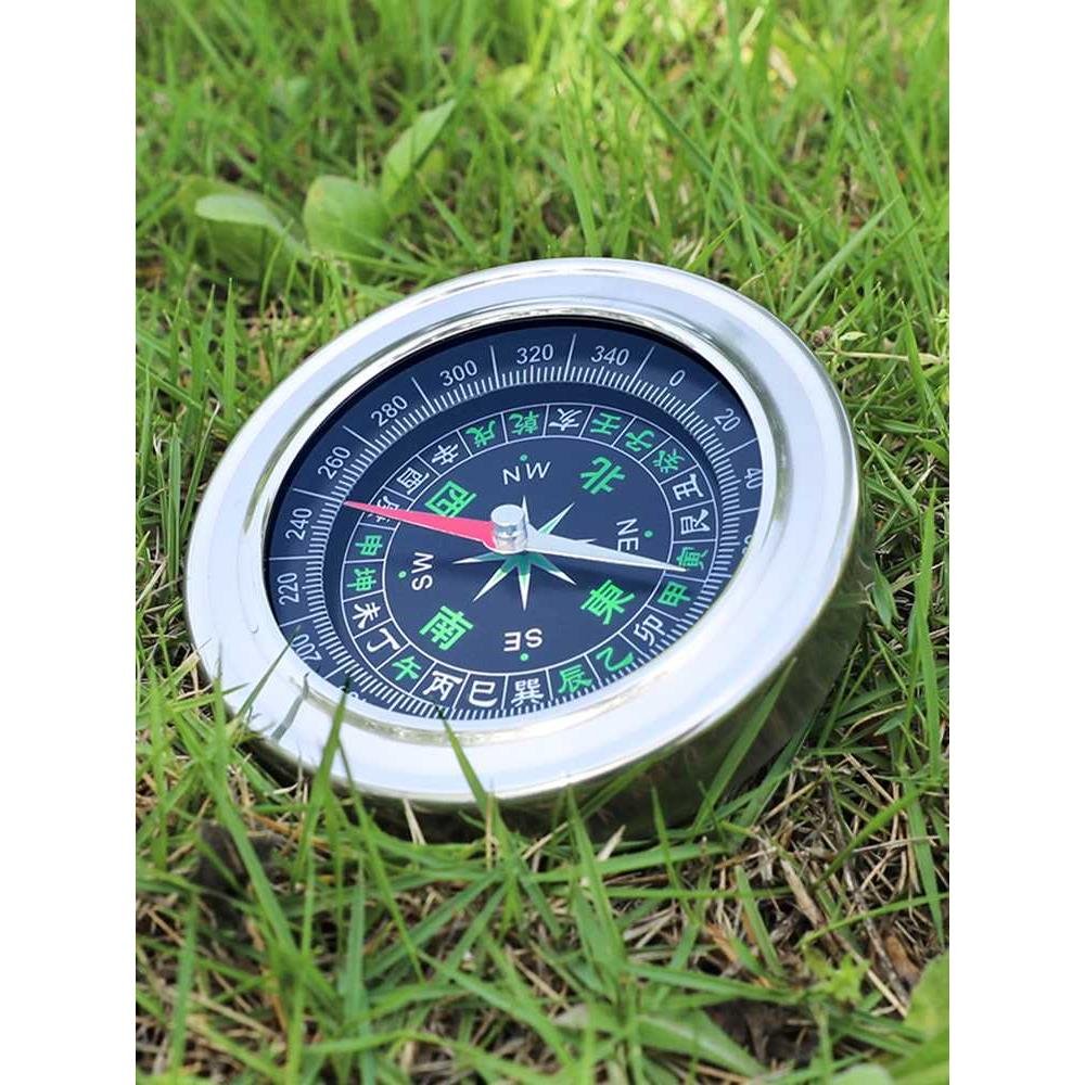 An outdoor mini-guided multi-purpose hiking camp pointing north towards the waterproofer