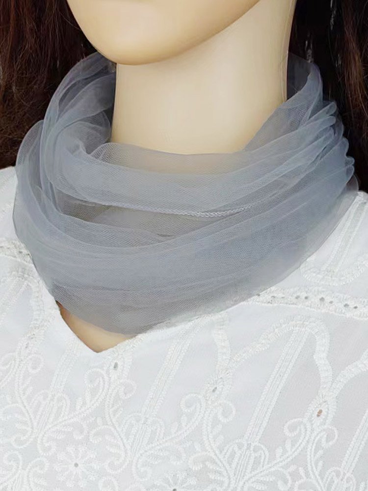 The sweet lady with a little tweezer on her neck