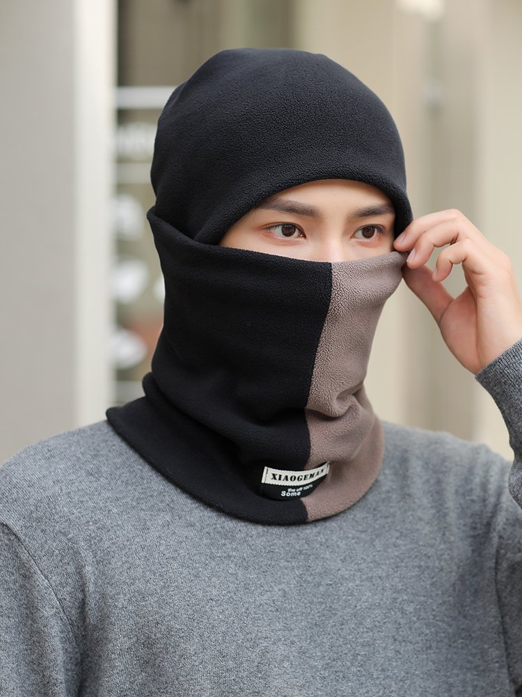 A man with a hat and a man with velvet and a man with a hood and a neck turban