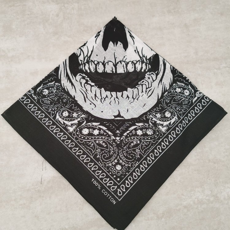 A man's and a woman's turban with a skull shawl on his head