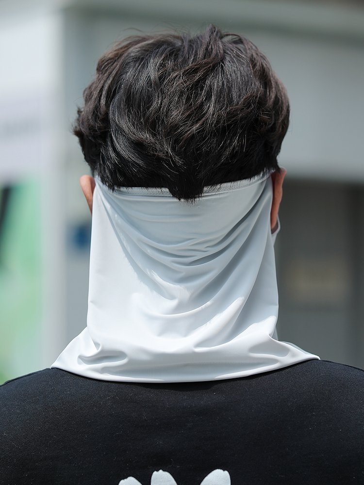 The sunscreen male wears a hood around his neck and he wears a hood around his neck