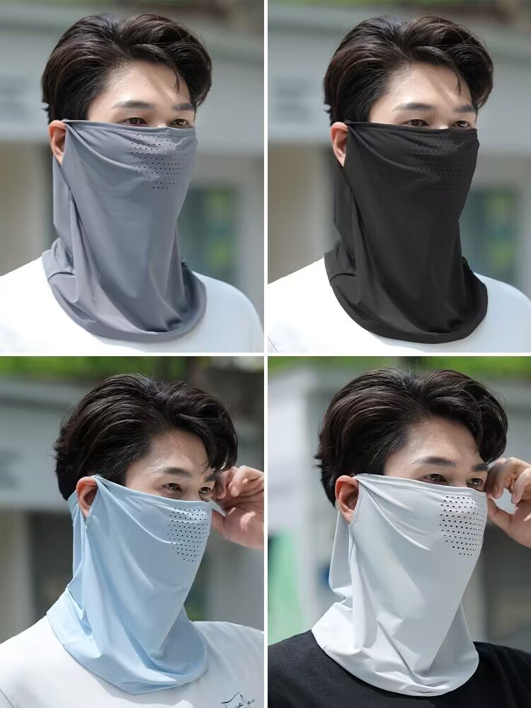 The sun masked man riding a turban outside his neck to catch a fish turban with an iced veil on his face