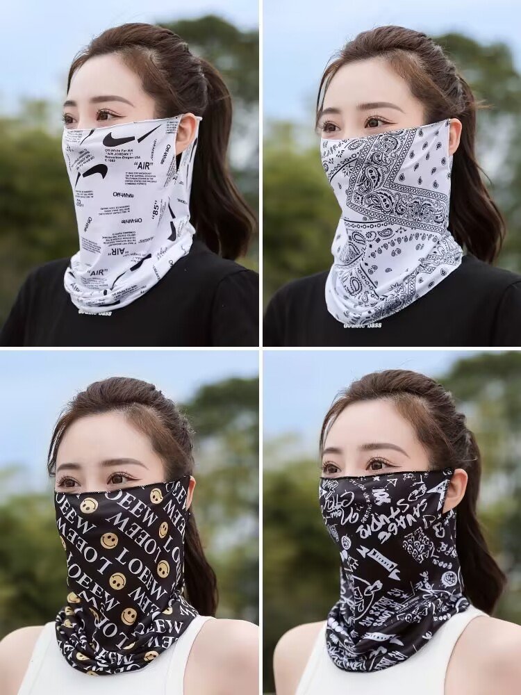 The sun masked woman with a turban on her face and a hood on her neck