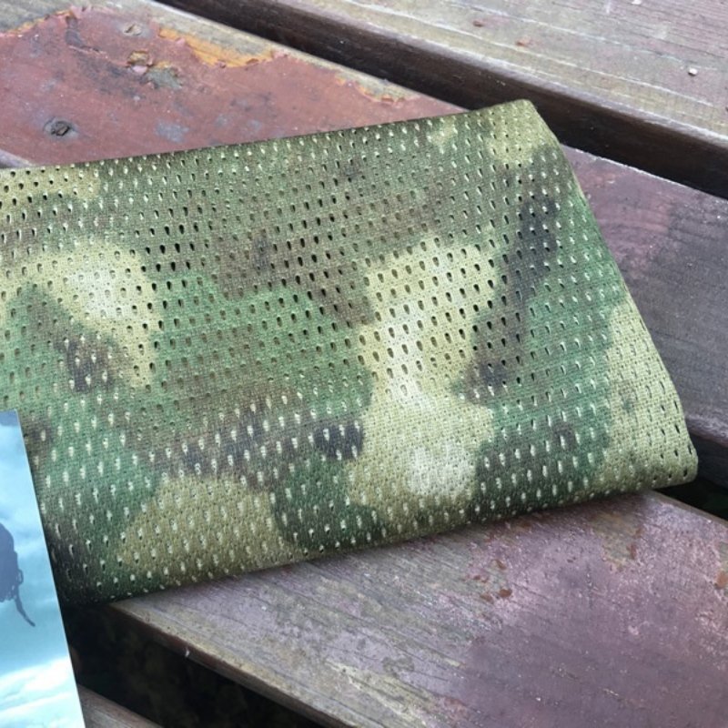 The army's hot-coloured scarf outside of the house