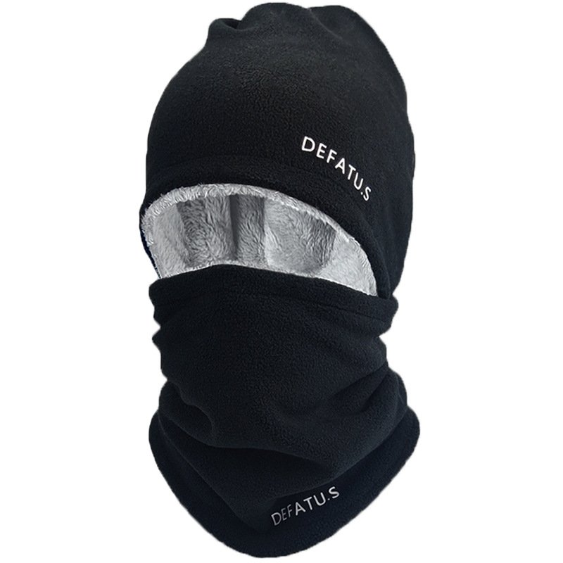 A man who rides a hood in the winter, a man who wears a hood, a man who wears a hood, a man who wears a wind and a velvet neck