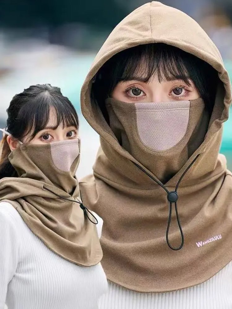 Winter hat mask, one-on-one, rides a cold masked man on a windshield, hooded woman