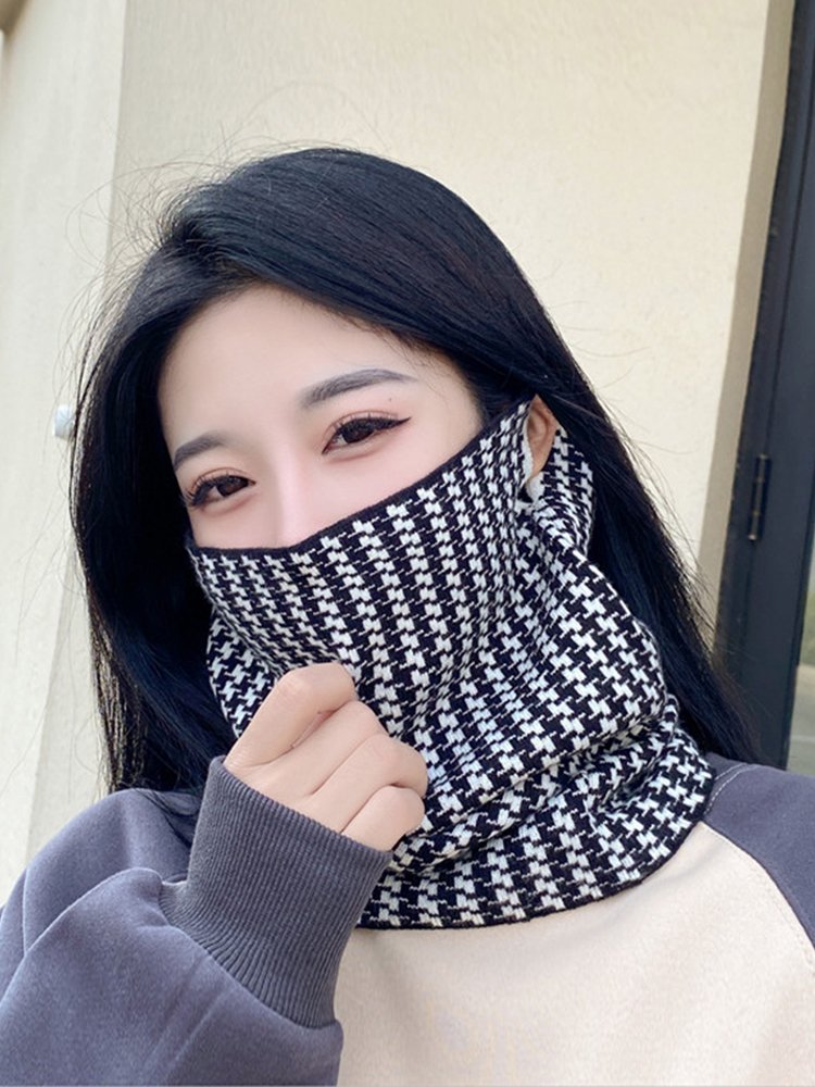 He's wearing a headscarf around a woman in the autumn and winter