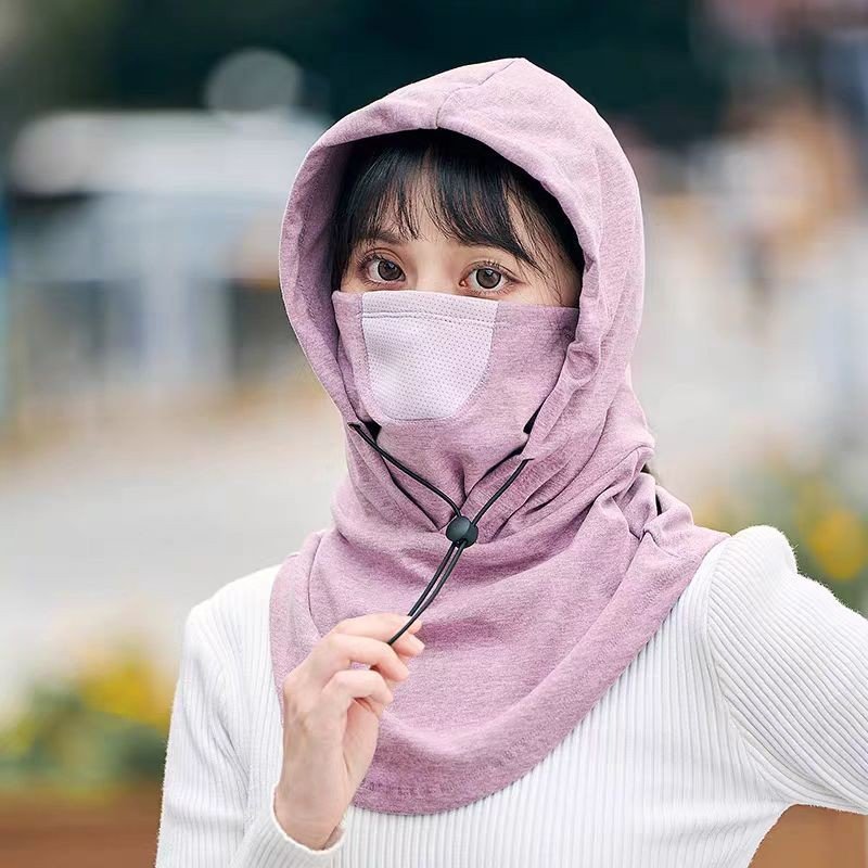 The winter man lady rides a snowboarding hood, a wind hat and a dust mask hat