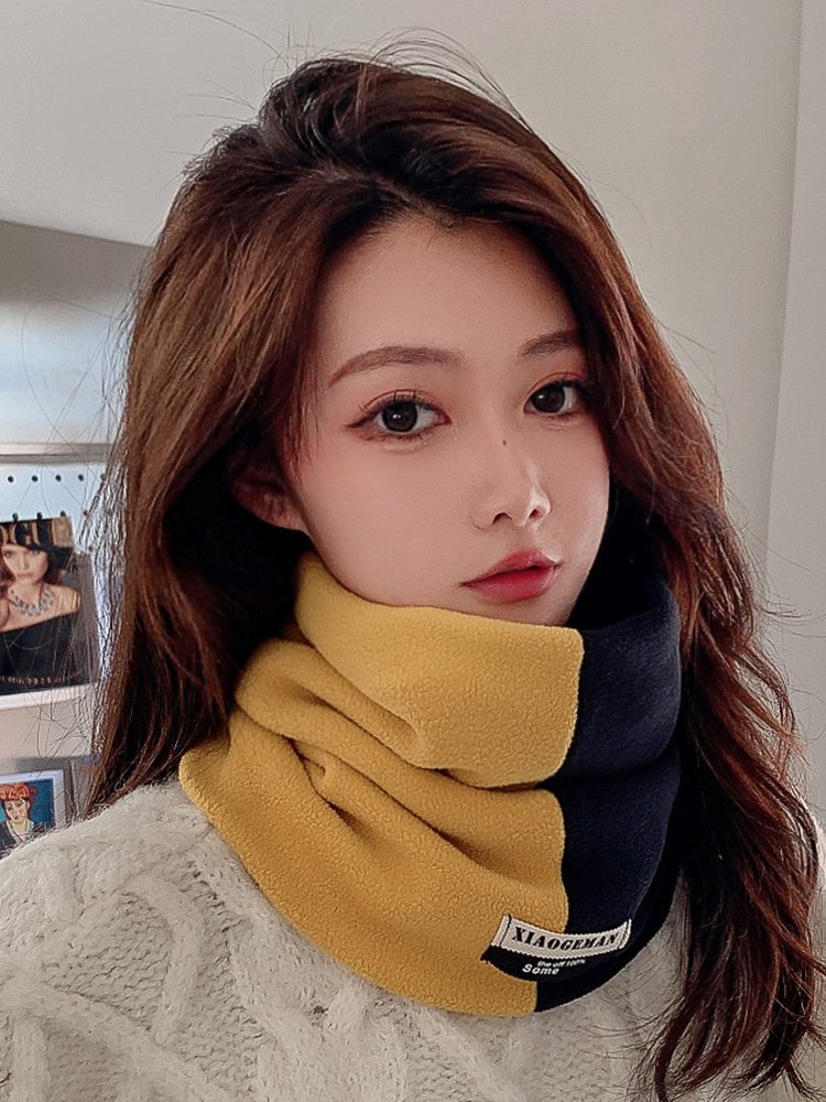 In the winter, men and women with velvet and thick-grained outdoors ride a hood with a neck scarf cap