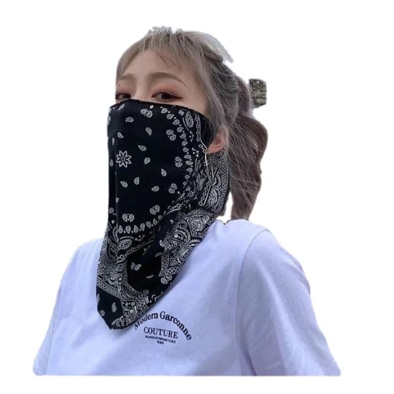 "Summer sunscreening of the face mask of the woman's ice-filtered face to protect her face from the sun"