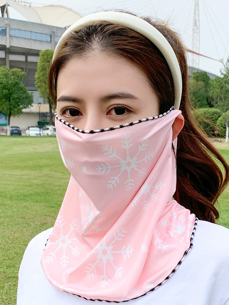 The summer sun-skinned lady with a neck-covered motor turban on her face
